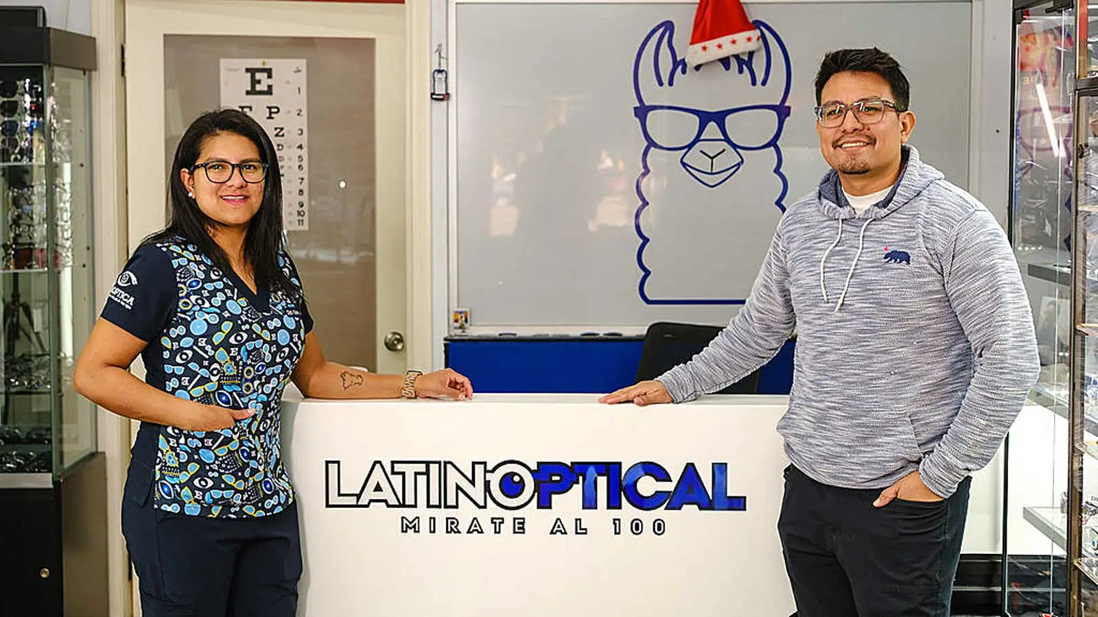 Owners of Latina Optical in their office.