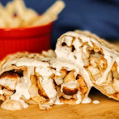 Ooey Gooey wraps with a bucket of fries at The French Way