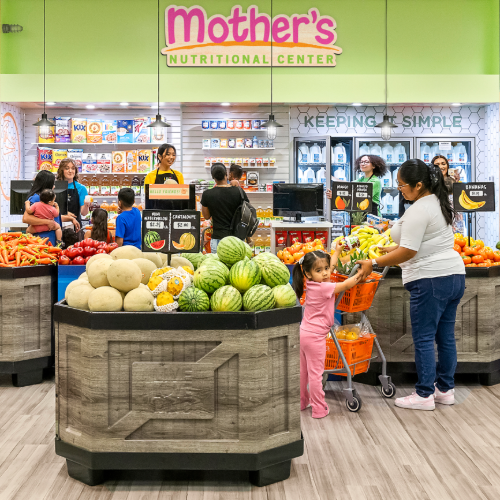 Photo of mother shopping at grocery store